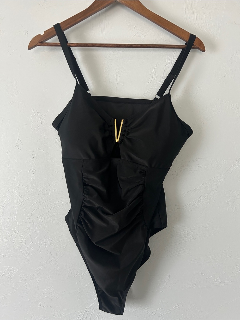 Classic Ruched Slimming Black One-Piece Swimsuit with Gold V Neck Accent